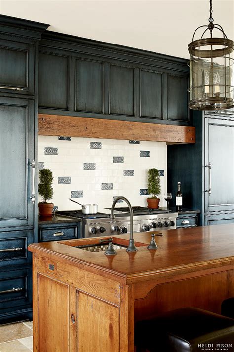 Renovating a kitchen is one of the most expensive remodeling projects that you can take on, and if you're open to spicing up your kitchen's look, incorporating a faux finish can transform its style into shabby chic, rustic, provincial, or modern. Navy Kitchen Cabinet Paint Color - Home Bunch Interior ...