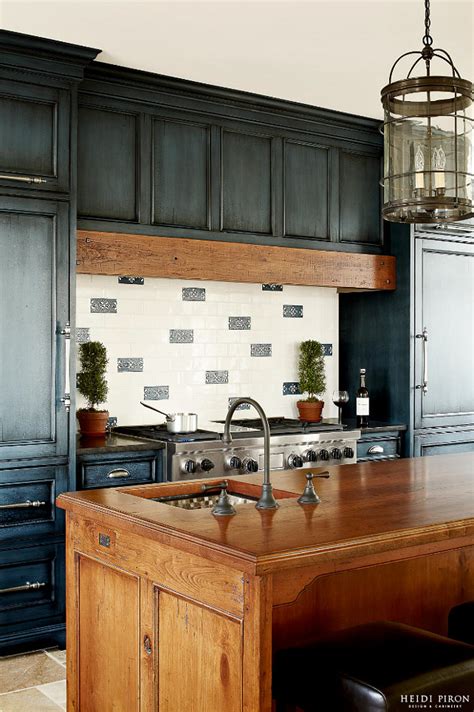 Hale navy on lower kitchen cabinets still looks bright and inviting when paired with the white upper cabinets and warm wood flooring in the project below. Navy Kitchen Cabinet Paint Color - Home Bunch Interior Design Ideas