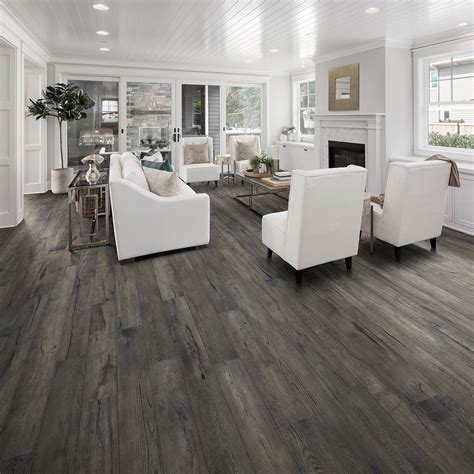 Living room flooring is a big investment, as it'll most likely be one of the biggest, if not the biggest room in the house to furnish. One Living Room, Seven Ways | Living Room Hardwood ...