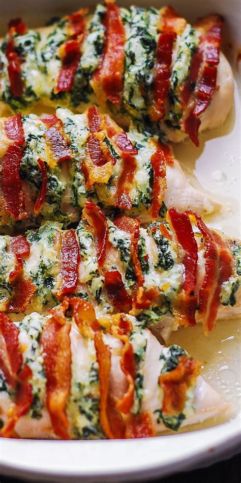 Cook in preheated oven for 25 minutes. Hasselback Chicken stuffed with Spinach Dip and Bacon ...