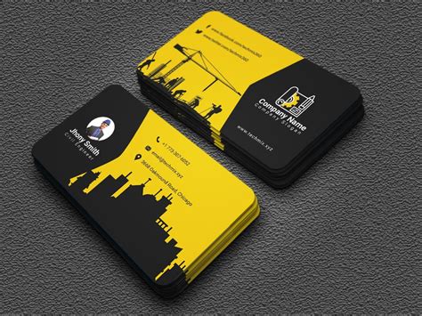 Two Business Cards With Yellow And Black Designs On The Front One Is