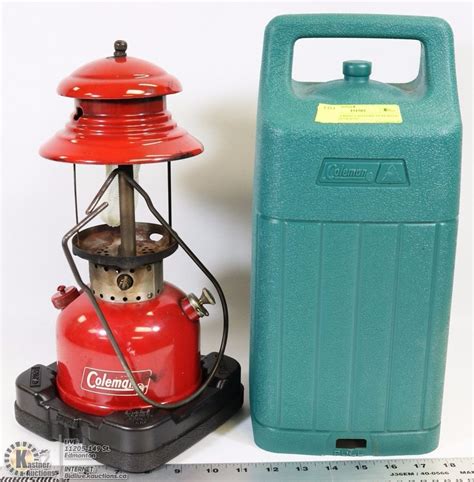 Old coleman mantle lanterns show up frequently at garage sales or in thrift stores. RED COLEMAN LANTERN IN PLASTIC CASE (NO GLASS)