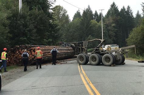 Driver Unhurt After Logging Truck Spill Near Sproat Lake Albernica