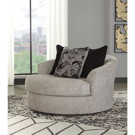 Oversized round swivel chair can be useful if you want to switch from one desk to another or if you sit down and get up often. Signature Design By Ashley Megginson Contemporary ...