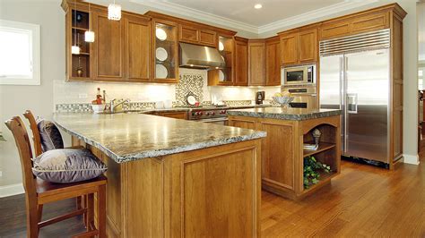 Start with your kitchen cabinets—not only will they be your kitchen's most dominant element, but they'll also probably take longer to get than any other component. Schmidt Furniture Gallery - Kitchen Cabinetry