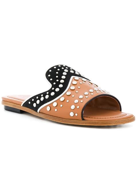 Tod also undertakes historical props, consultancy and engineering work for tv: Tod's women's flats slippers sandals in tan leather ...