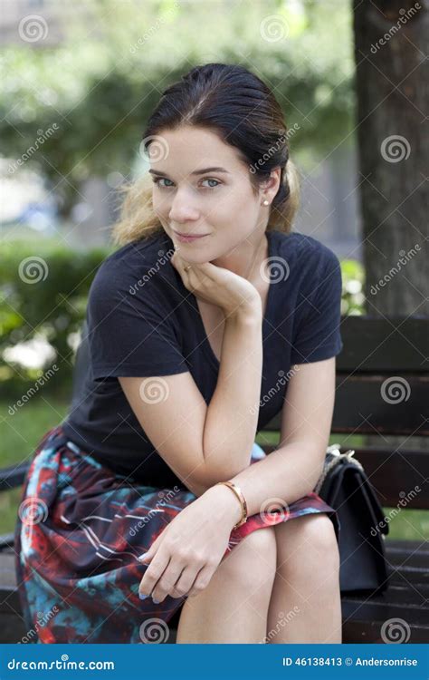 Brunette Sitting On A Bench Stock Image Image Of Brunette Girl 46138413