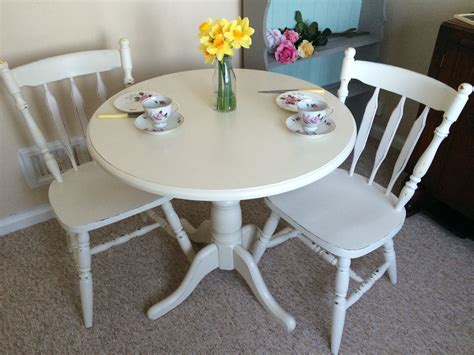 Cute little two seater table and chairs. Great for a small kitchen