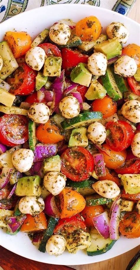 Perfect spring and summer salad! Tomato Cucumber Salad with Avocado, Mozzarella, and Basil ...