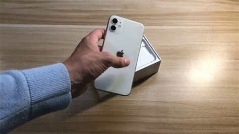 Iphone 11 White Colour In Hand Holding Iphone 11 White Color Version