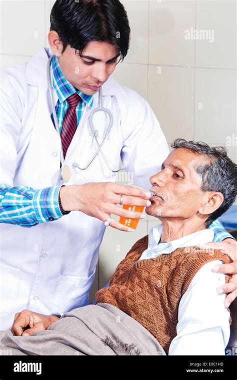 Indian Doctor Hospital Patient Feeding Juice Stock Photo Alamy