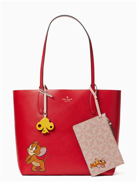 In celebration of the upcoming lunar new year, we teamed up with tom & jerry to create this red faux leather small bifold wallet printed with an adorable motif of the series' famed jerry mouse for the year of the rat. kate spade new york x tom & jerry large revrsble tote ...