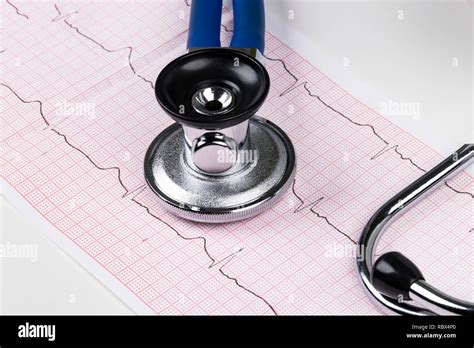 Stethoscope On The Electrocardiogram Ecg Graphmedicine Concept