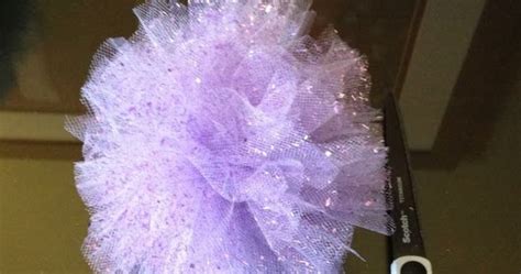 If you'd like to make realistic looking flowers, use colored materials and arrange the petals so they look natural. Ashley Thunder Events: Mom Mondays: DIY Tulle Flowers