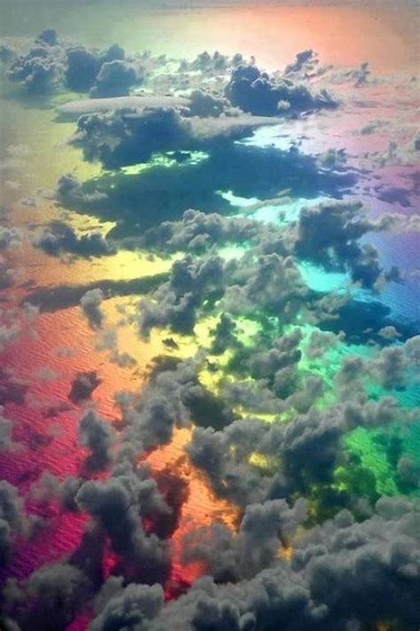 Picture Taken From A Plane Above Clouds And A Rainbow Fire Rainbow