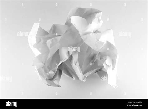 White Crumpled Paper Ball On White Background With Clipping Path Close