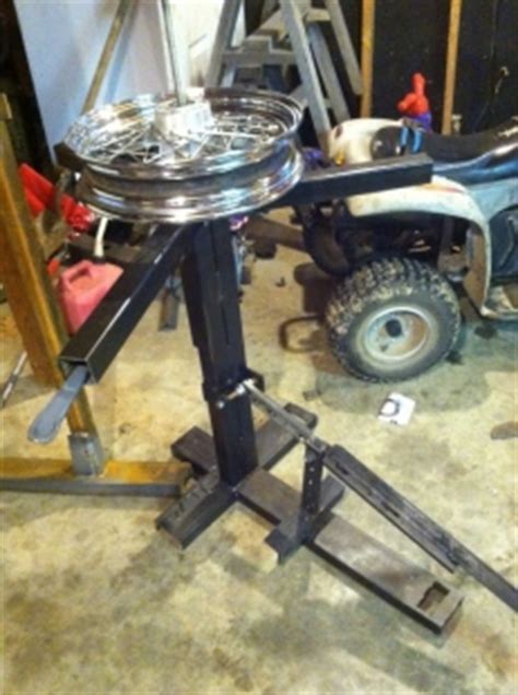The bottom rim got bolted to the concrete floor by way of a couple of drop in anchors after being drilled (this allows it to be removed with. Homemade Motorcycle Tire Changer - HomemadeTools.net
