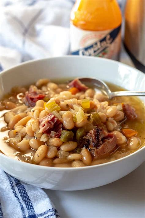 Stir chicken broth, white beans, tomatoes, cabbage, ham, and celery into the pot. Instant Pot Ham and White Bean Soup {No Presoaking Dry Beans}