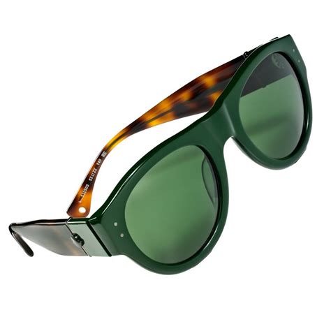 Prescription eyeglasses starting at $95. Green with envy: Moncler sunglasses | How To Spend It