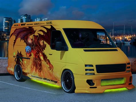 A Yellow Van With A Dragon Painted On It