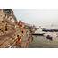 Varanasi India Men Bath Themselves In The Ganges River Photograph By 