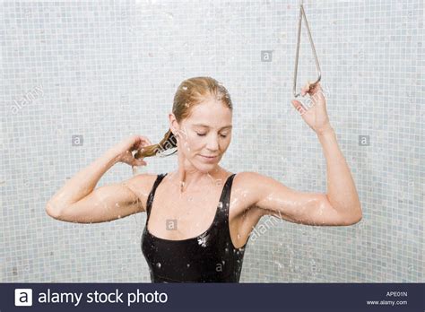 Woman In Bathing Suit Taking Shower Stock Photo 15761552 Alamy
