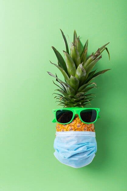 Premium Photo Pineapple With Sunglasses And Protective Mask