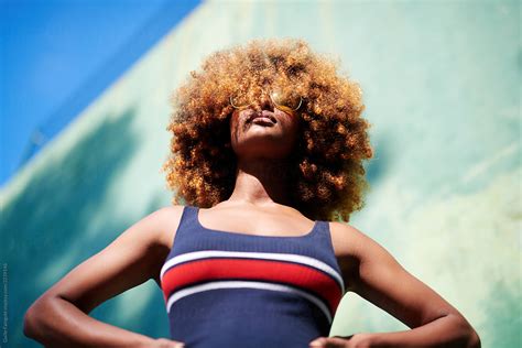 Confident Black Woman In Sunglasses Outdoors By Stocksy Contributor