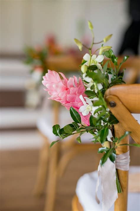 A sweet outdoor wedding needs a delicate seating arrangement. Wedding Ceremony Chair Floral Decor in Pink, White & Green ...