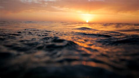 Sunset And Ocean Waves By Austin Schmid