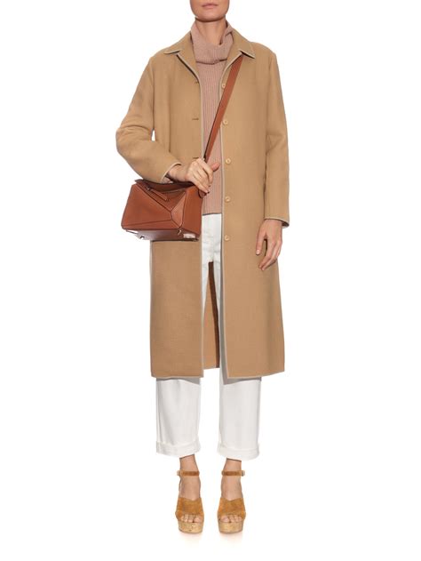 Maybe you would like to learn more about one of these? Loewe Puzzle Small Leather Bag in Brown - Lyst