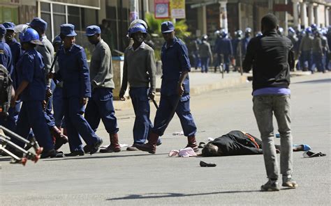 The Latest Protesters Police Clash In Zimbabwes Capital