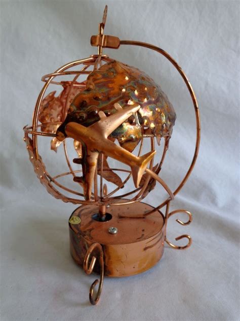 Shop with afterpay on eligible items. Copper Globe Music Box Around the World in 80 Days Airplane Metal | Music box, Vintage metal, Metal