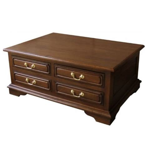 This modern and practical 8 drawer coffee table with its stylish 'trunk' quality acts as a wonderful storage unit as well as a convenient coffee table. Mahogany 8 Drawer Coffee Table