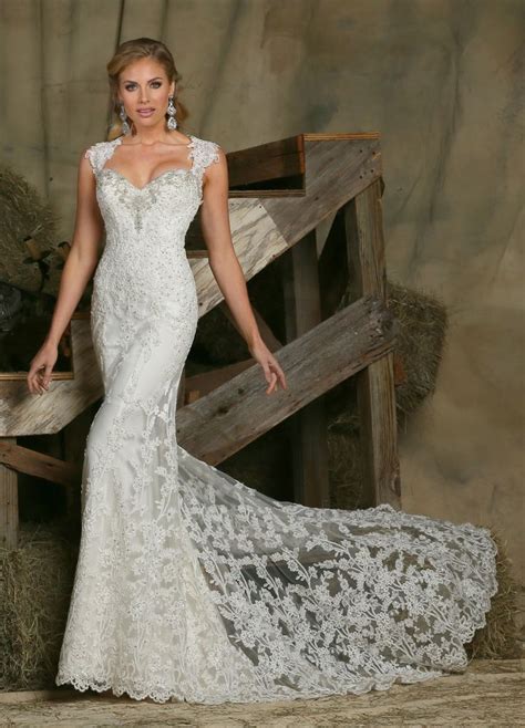 Lace Fit And Flare Wedding Dress Features A Beaded Lace Bodice With