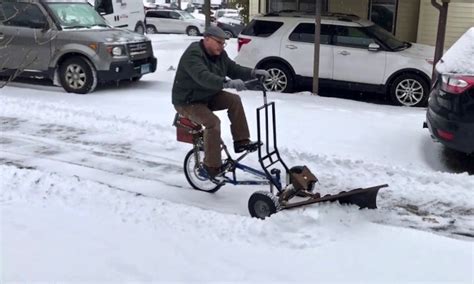 Tired Of Shoveling Man Invents Bicycle Snow Plow