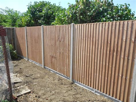 The deck height will be determined by a concrete stoop near the door. 6ft Concrete Fence Posts