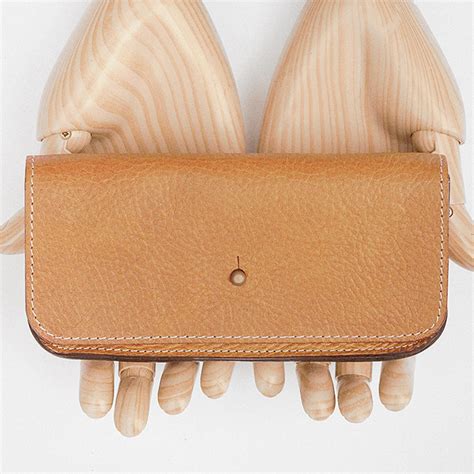 (c o s e c x {\displaystyle \mathrm {cosec} \,x}. Spectacle case in tan veg-tan leather — S.E.H Kelly
