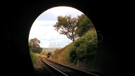 Steam train entering tunnel Stock Footage,#entering#train# 