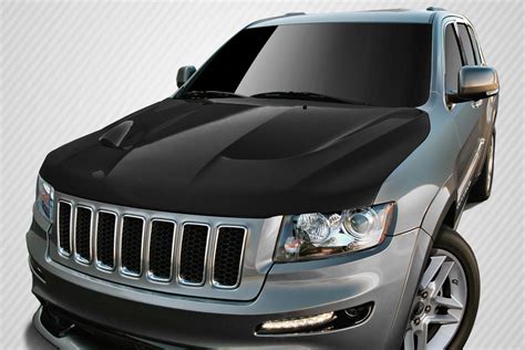 This hood will lighten the front of your car, but you won't sacrifice durability in the process. 2011-2019 Jeep Grand Cherokee Carbon Creations SRT8 Look Hood
