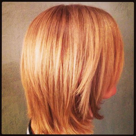 Wavy, high-lighted, layered bob styled out with flare... kL Groove
