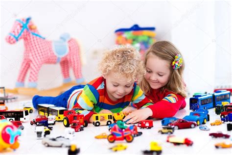 Little Kids Playing With Toy Cars Stock Photo By ©famveldman 116525996