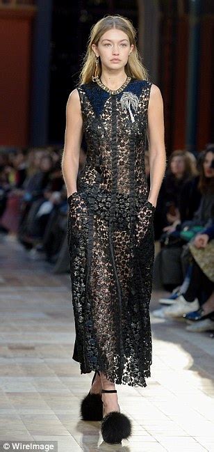 Gigi Hadid Heads Up The Runway In Semi Sheer Dress At Paris Fashion