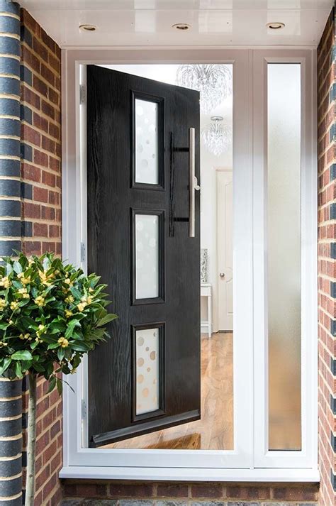 Installers of contemporary composite doors across northern ireland and dublin. Open black GRP contemporary door from Everest shown from a ...