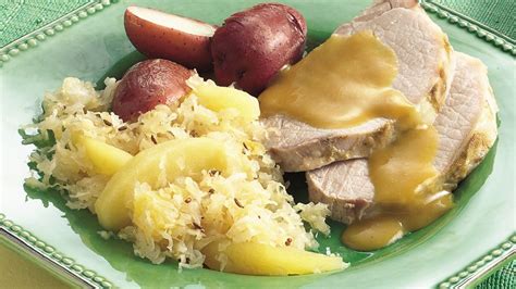 How to bake super tender, juicy pork and sauerkraut. Slow-Cooker Pork Roast and Sauerkraut Dinner recipe from ...