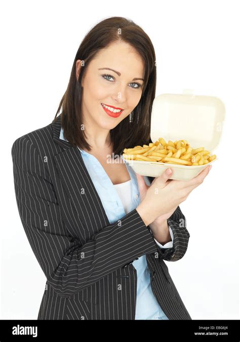 Attractive Business Woman Eating Take Away Chips Stock Photo Alamy