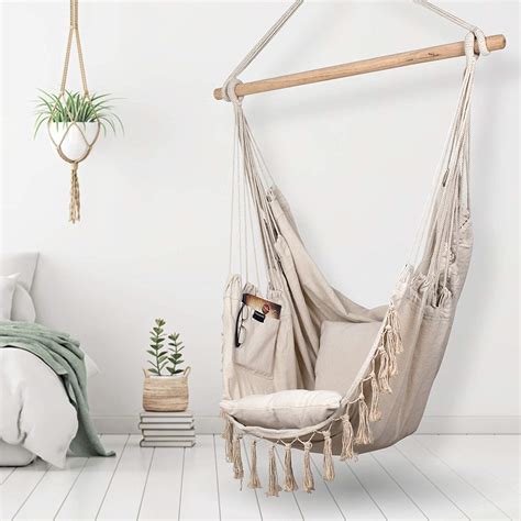 While choosing a swing chair for your home you must keep the color in mind, because a good color combination can offer an elegant look to your home. white-creme-ivory-hanging-chair-indoor-living-room-bedroom ...