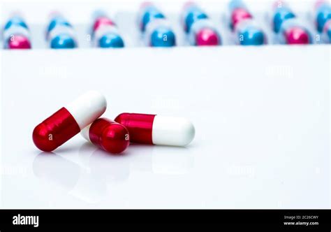 Red White Antibiotic Capsule Pills On Pills Pack Blurred Background