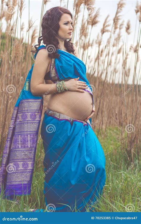 pregnant girl is wearing fashion blue indian sari stock image image of gestation clothes
