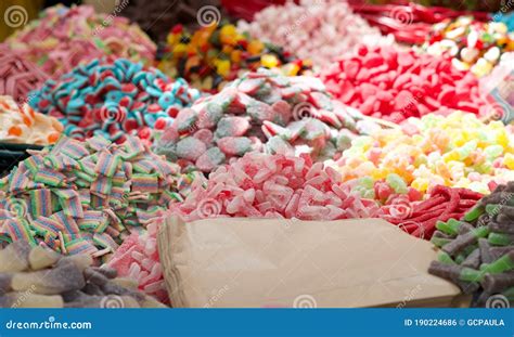 Close Up Of Piles Of Colorful Jelly Candies In A Market Paper Bags For